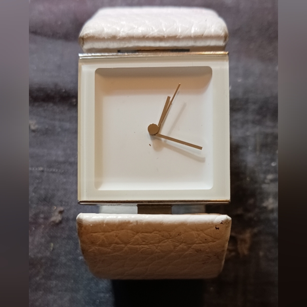 Lady's Phillipe Starck with Fossil Watch Co. White band
